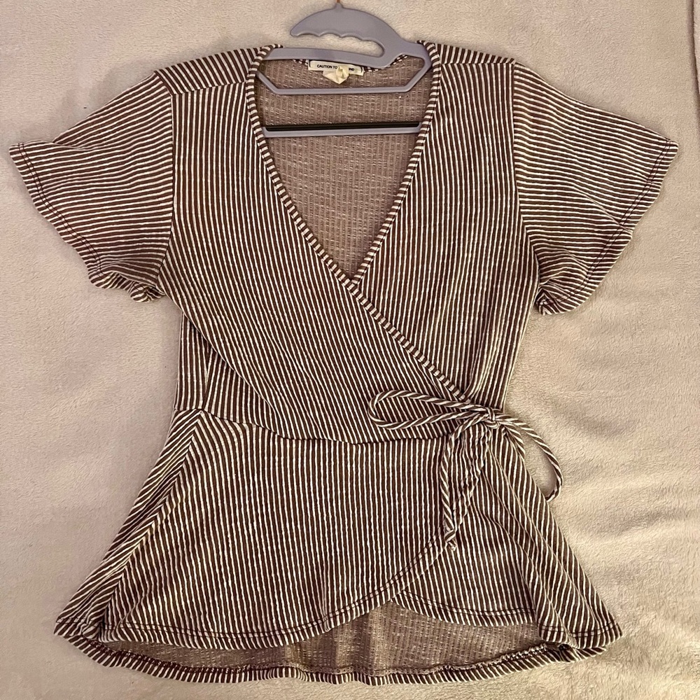 Striped brown and white shirt. Caution to the Wind size medium.